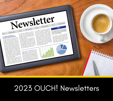 Image of a tablet with the words Newsletter on a desk with an empty coffee cup next to the tablet