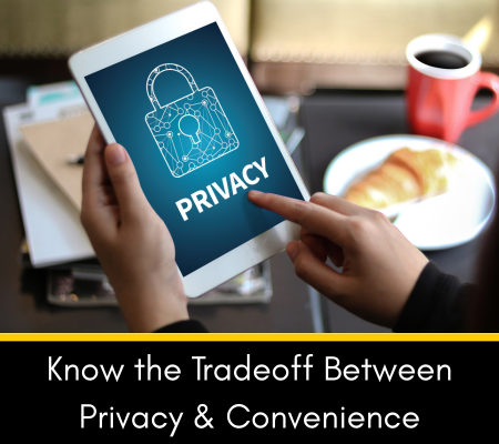 Someone holding a tablet while sitting at a table with a pastry and coffee.  The tablet says Privacy, with a lock on it