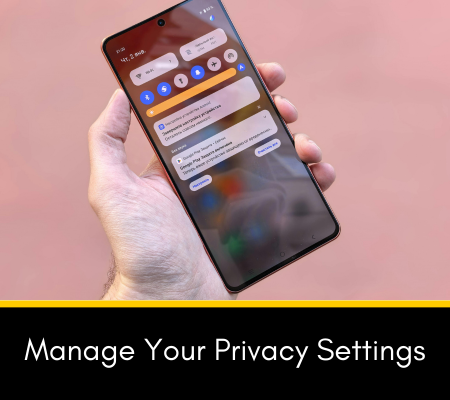 Hand holding a cellphone with settings pulled up, with the words Manage Your Privacy Settings