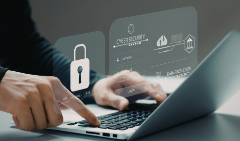 Someone's hands working on a laptop with a lock and the words password, cybersecurity, data protection