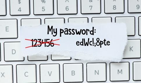 Image of a keyboard with a piece of paper that says My Password