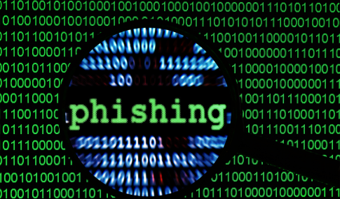 Image of the word Phishing under a magnifying glass