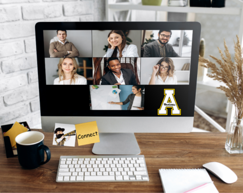 Laptop with a virtual meeting with App State Block A and a sticky note with Yosef and the words Connect